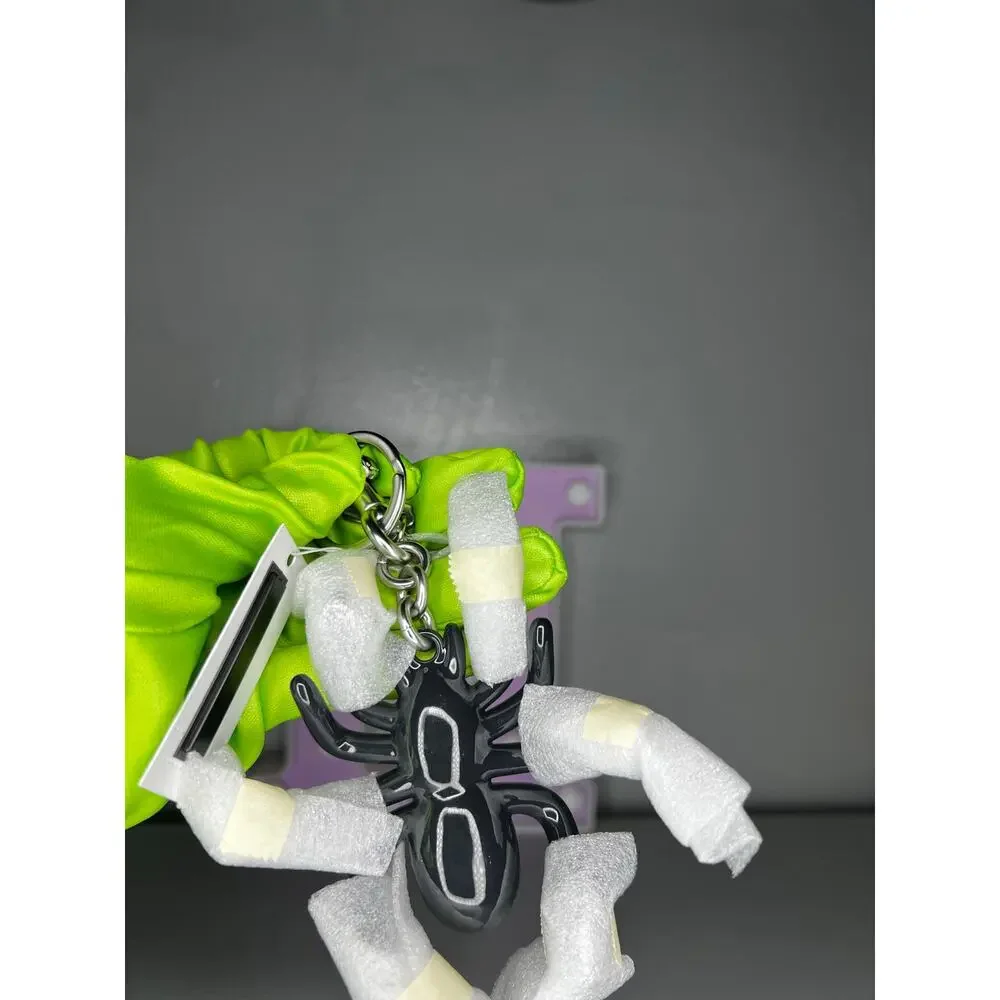 Coach Spider Charm